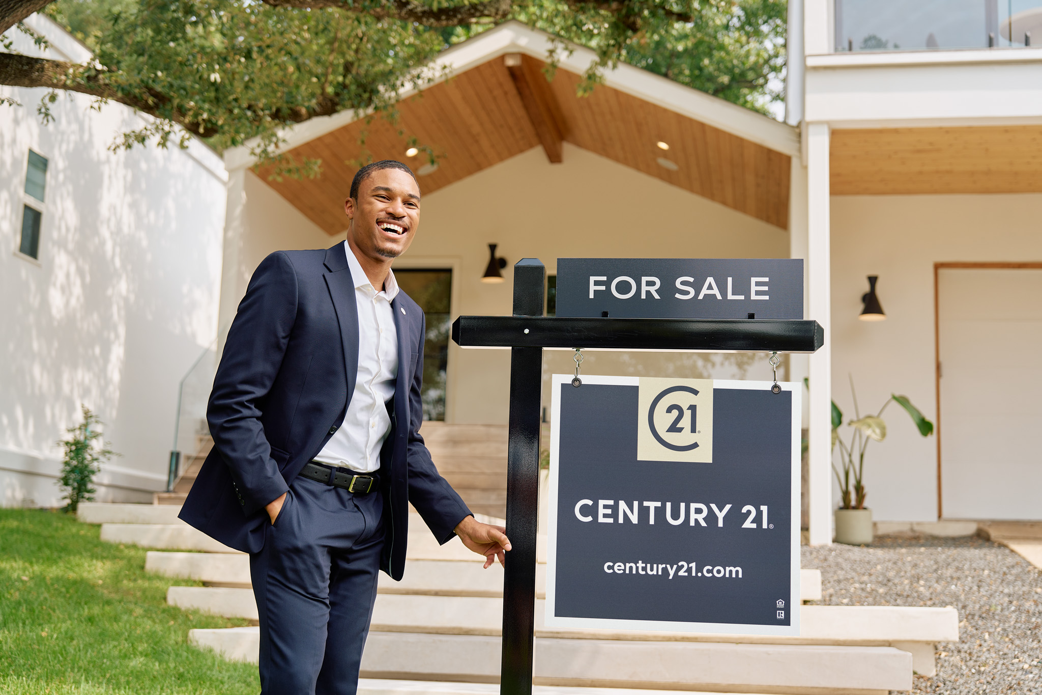 Real Estate Agent with sold sign